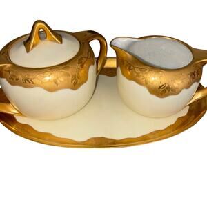 Vintage gold porcelain creamer and sugar by Thomas Bavaria beautiful pieces